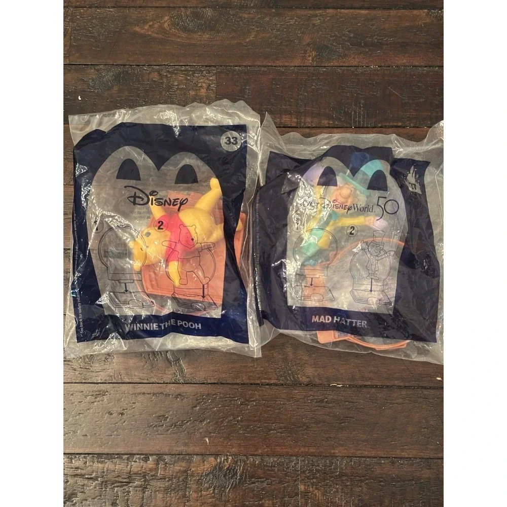 2021 McDonald's Disney's Anniversary Collection #33 Pooh and #37 Mad Hatter